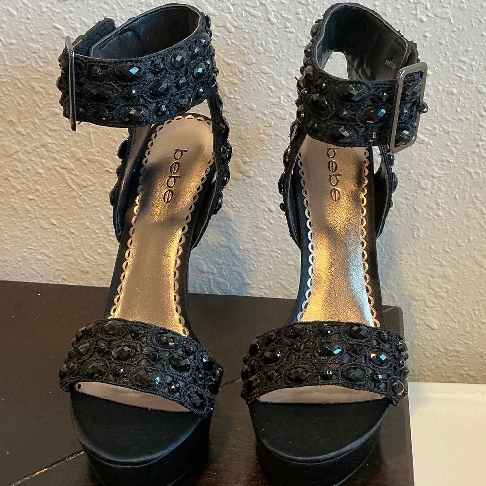 bebe Black Jeweled Ankle Strap Platform Heels. They just didn’t work for me.